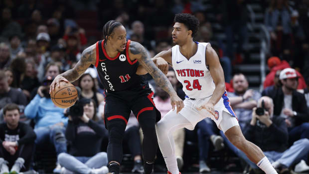 Detroit Pistons guard Quentin Grimes (24) defends against Chicago Bulls forward DeMar DeRozan (11) during the first half at United Center.